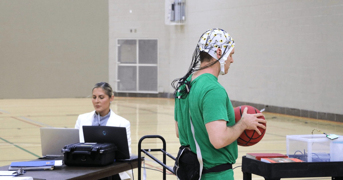 basketball player with brainwave cap on