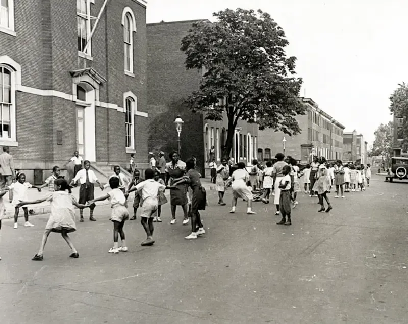 Black and white picture of students playing outside