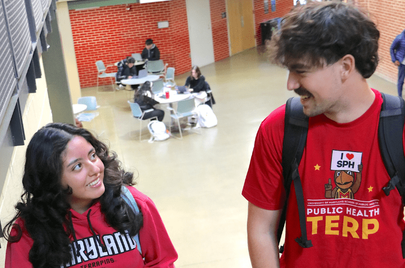 Two UMD students on stairwell