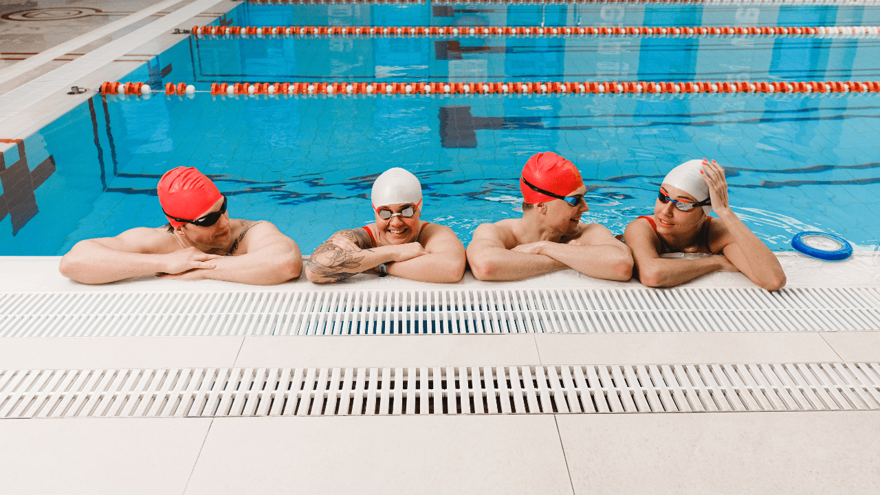 Students resting in the pool after class