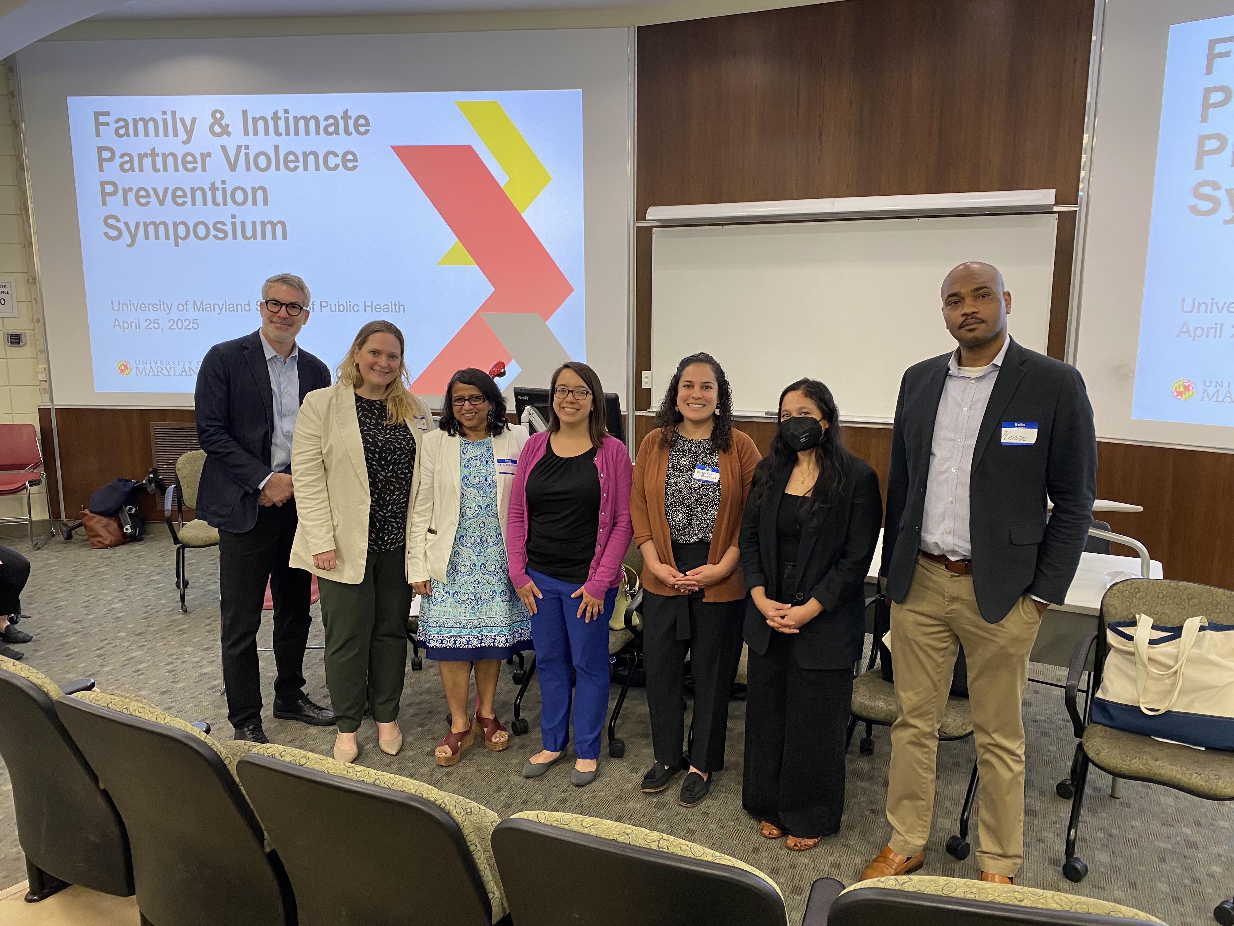 Panelists pose for a photo at first symposium on violence prevention