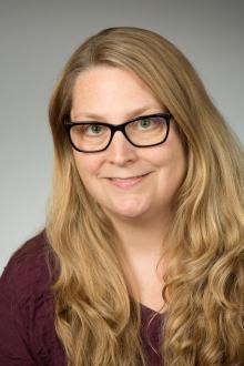 Rebecca Foss, Family Science Doctoral Candidate and CARES Lab Grad Student, Person with long blonde hair and glasses