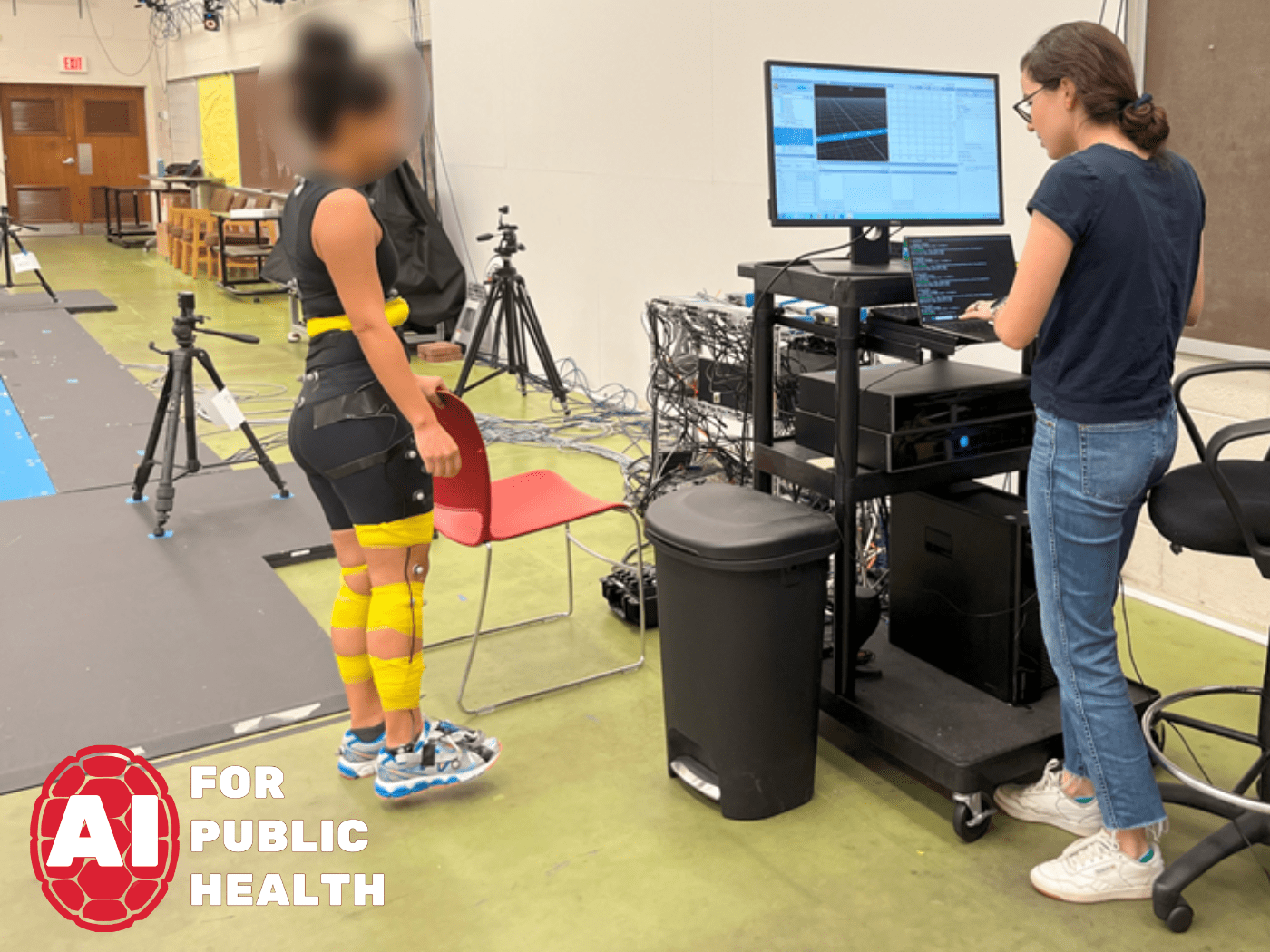 study participant tests a wearable device with researcher