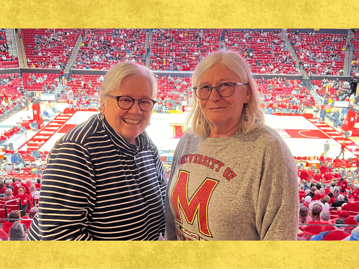 Drs Clark and Whitall at UMD basketball game
