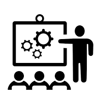 Teacher pointing to board in front of students