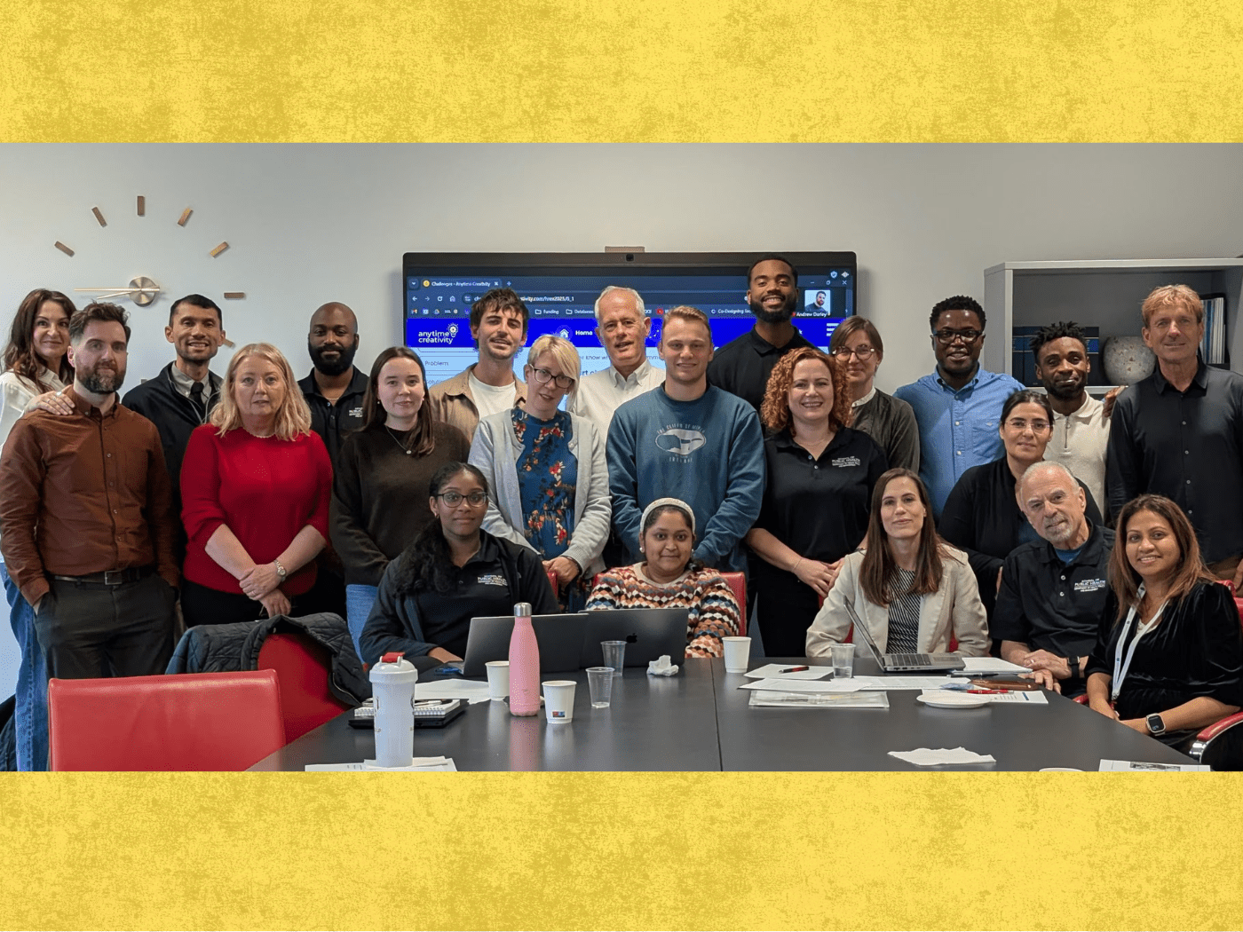 a group of international scholars gather for photo