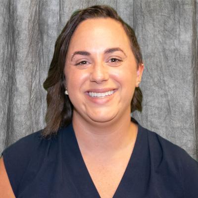 Photo of Dr. Paula Strassle in a blue shirt