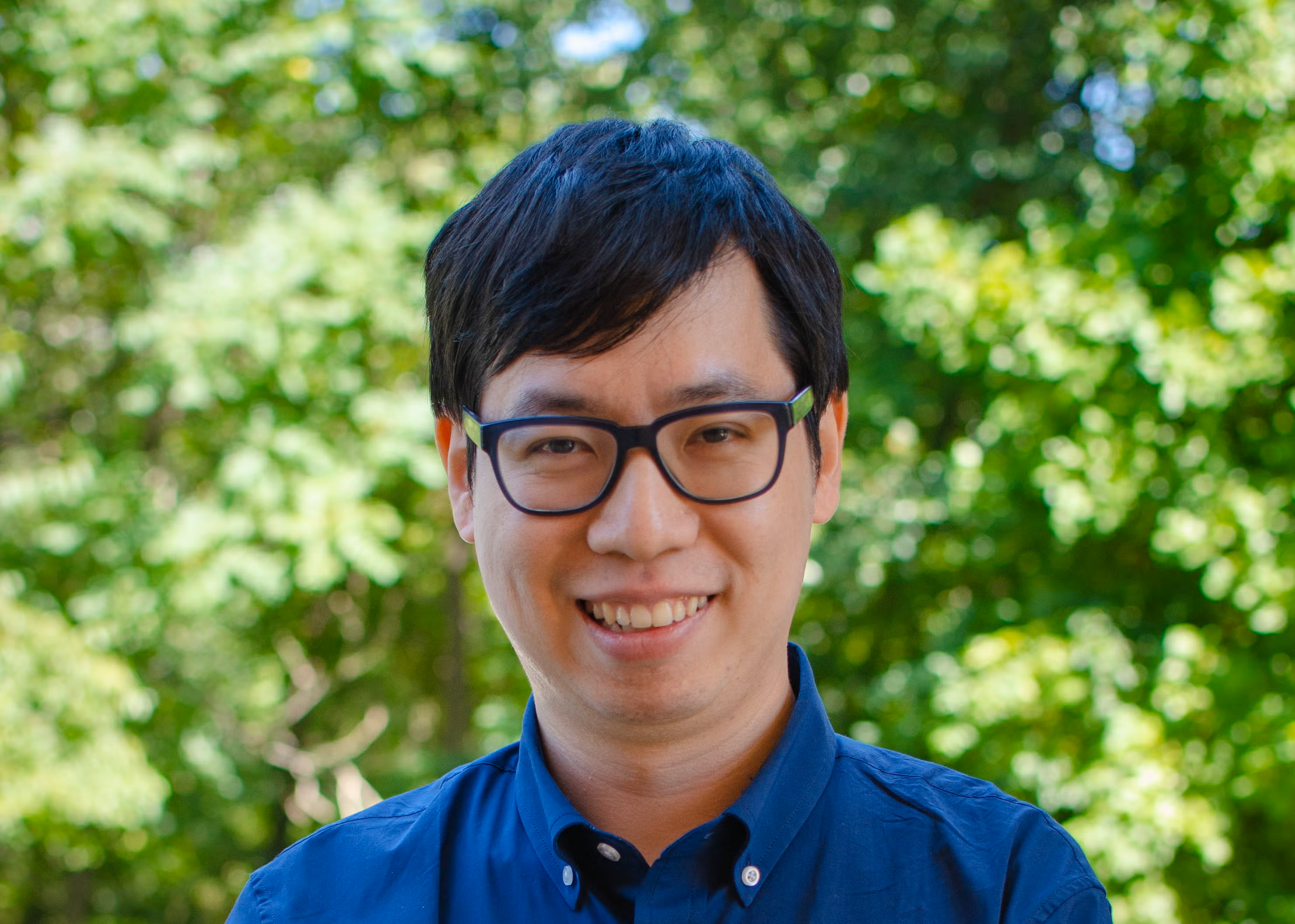 Photo of Dr. Tianzhuo Ma in a blue shirt