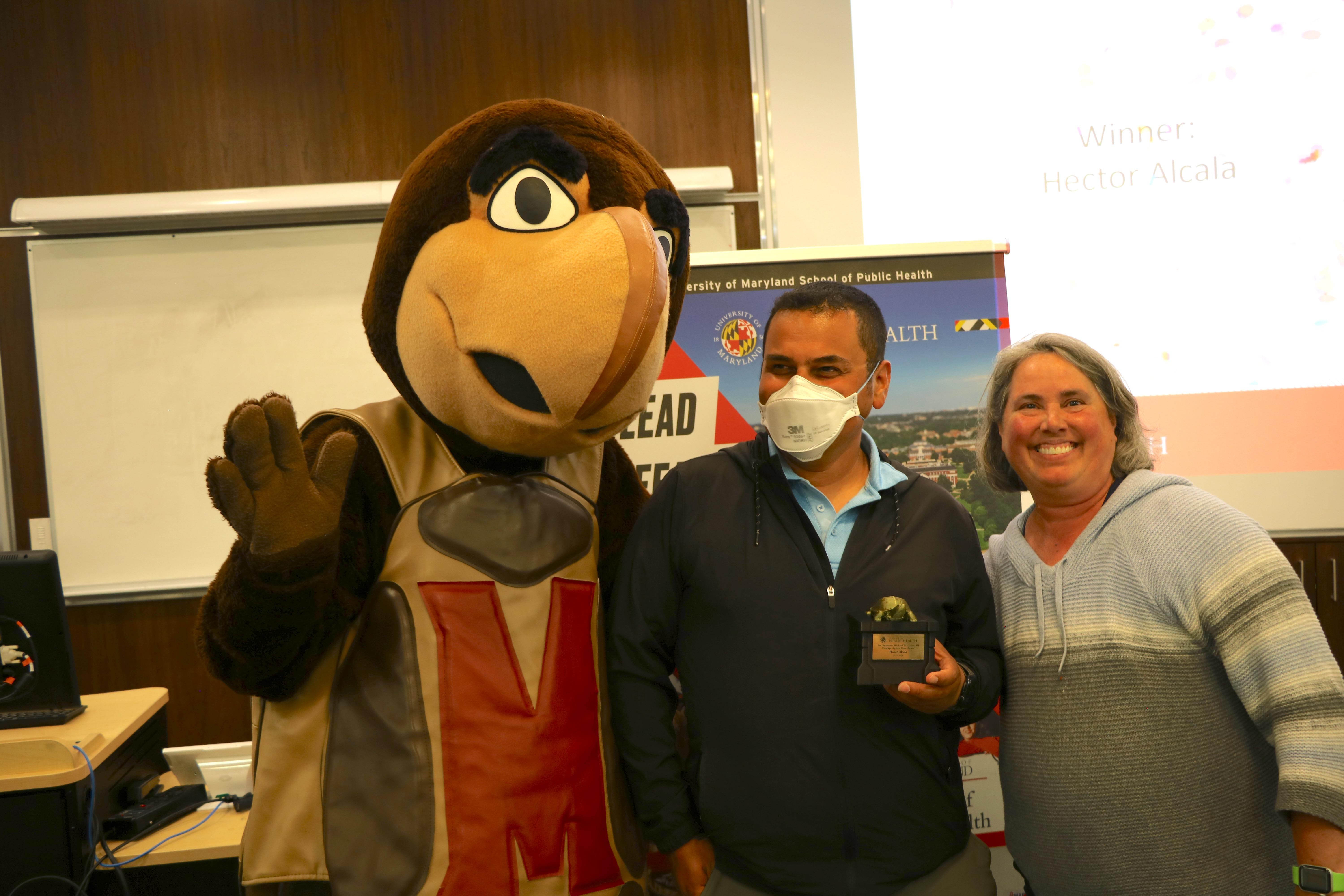 group photo of faculty members winning an award