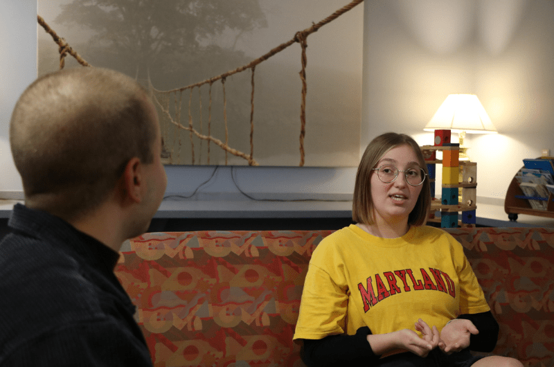 two students conducting a therapy session