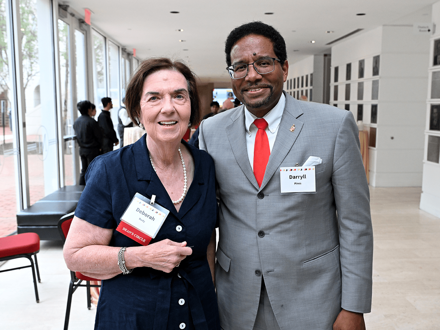 Alumna Deb Rudy ’73 standing with President Darryll Pines