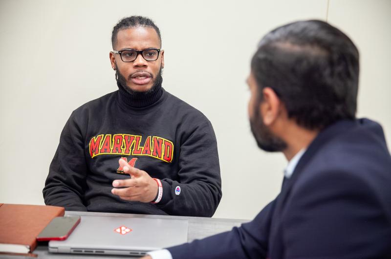 graduate student speaking with professor