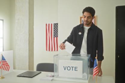 A man casting a vote