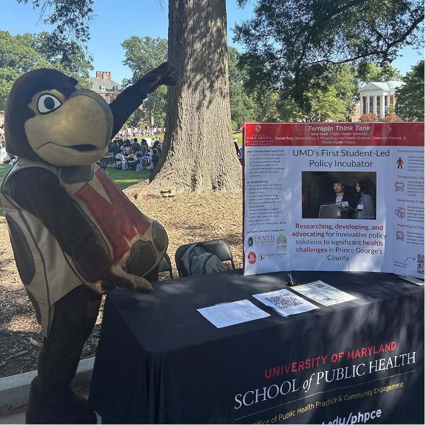 get involved with TTT photo of mascot by booth